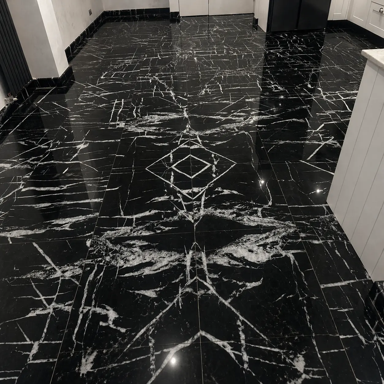 Nero Marquina black marble kitchen floor, full mirror polish